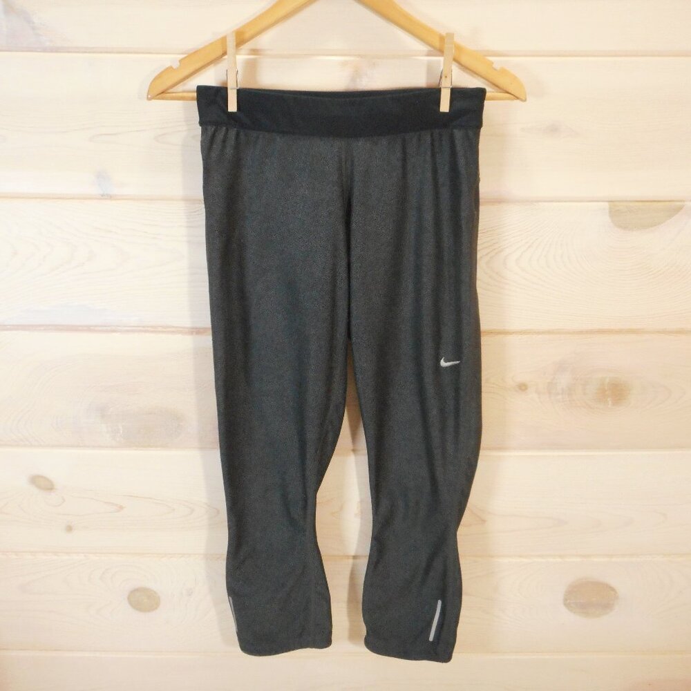Nike Women's size M Dri-Fit Relay Crop Tights Running Activewear Zip Pockets